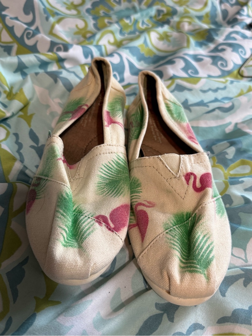 Toms slip ons.